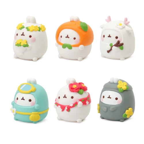 Set of six cute, colorful figurines with various accessories on a white background